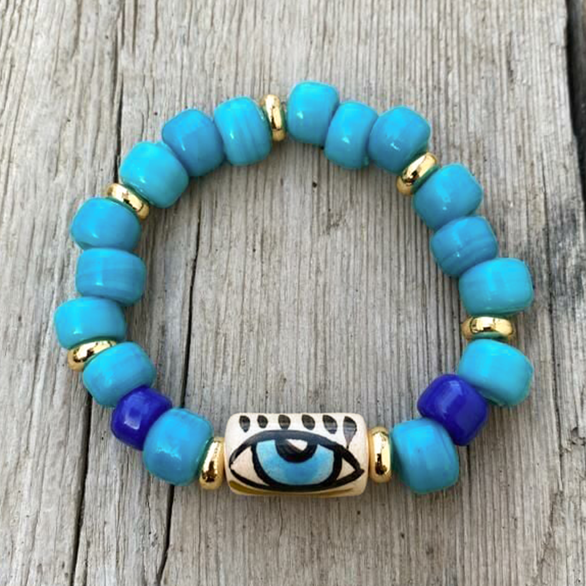 Sua Design Handmade Blue Glass Bead Elastic Bracelet with Ceramic Eye Detail | Sua Design Seramik Goz Detayli El Yapimi Mavi Cam Boncuk Lastikli Bileklik